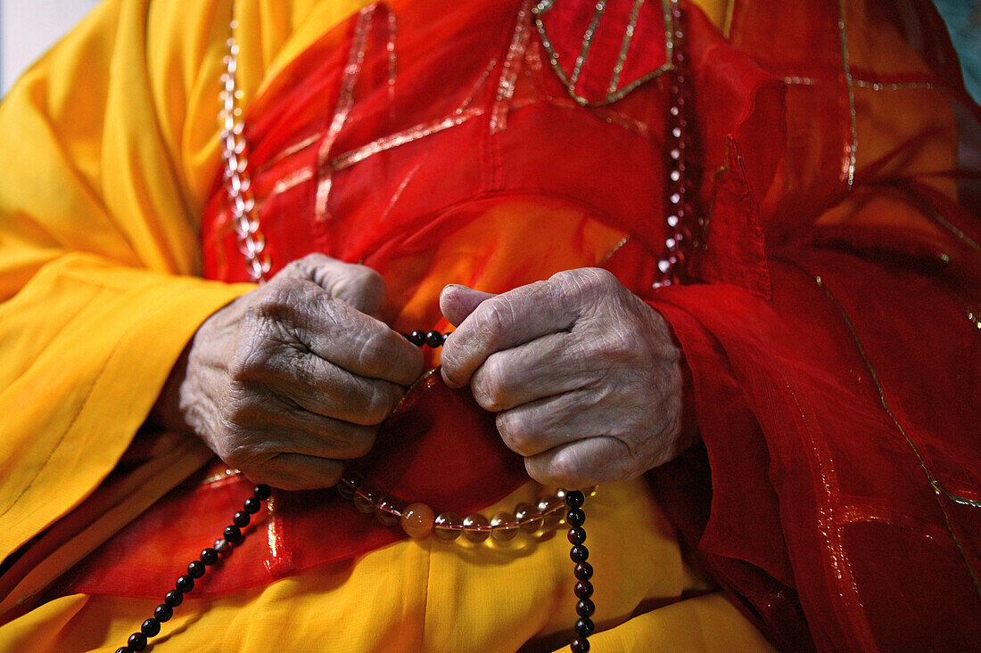 The abbot's hands holding prayer beads, Baotan Si monastery, Nantai, Heng Shan South, Hunan province, China, Asia
