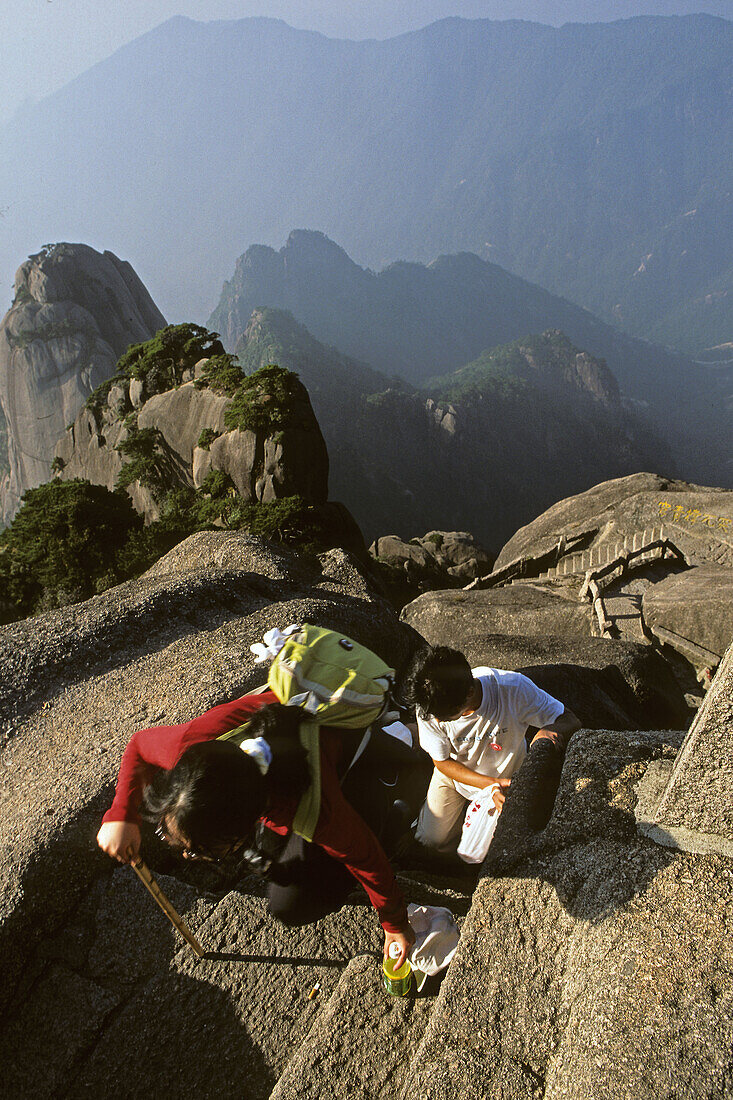 steep rock carved stone steps to Lotus Peak, Huang Shan, Anhui province, steep climb, stone steps, World Heritage, UNESCO, China, Asia