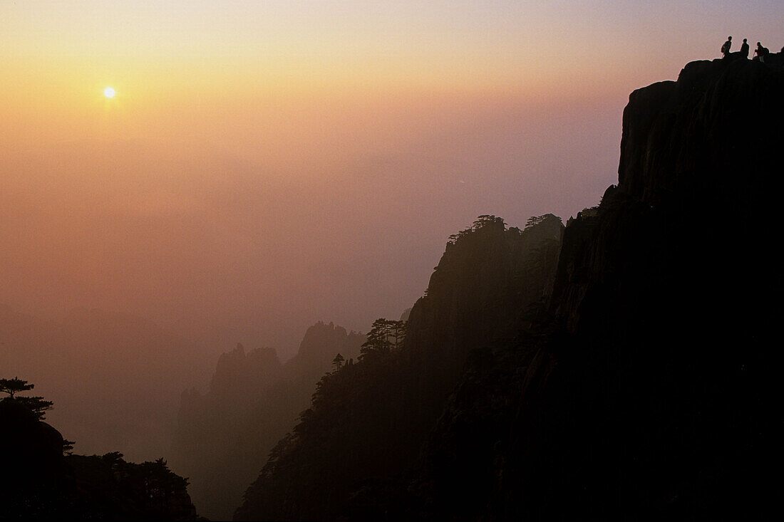 red sunset with mountain silhouette, Grand Canyon of Xihai, Huang Shan, World Heritage, UNESCO, Anhui province, China, Asia