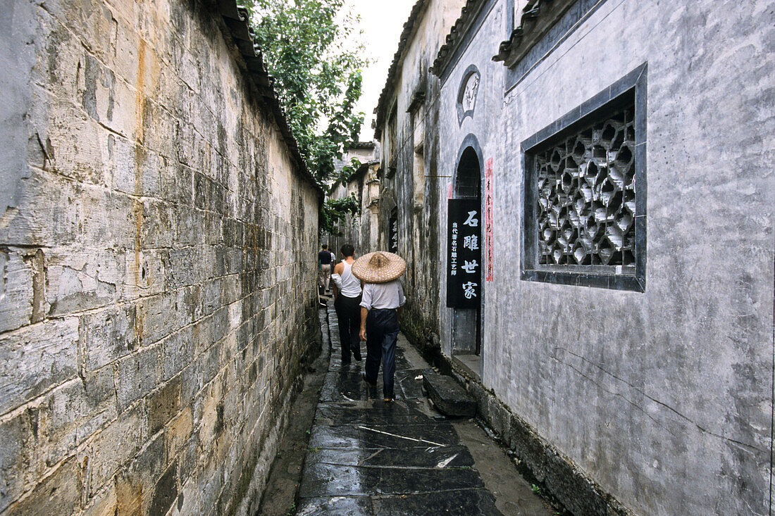 narrow lane between historic homes in ancient village, Hongcun, Huangshan, ancient village, living museum, China, World Heritage Site, UNESCO