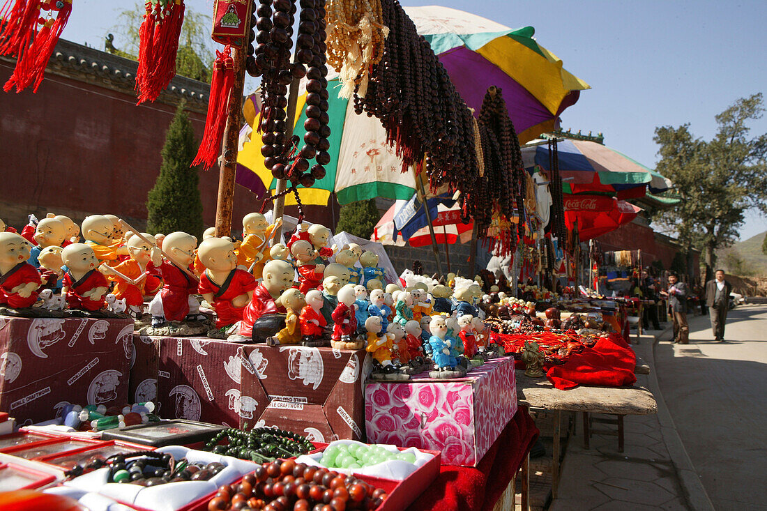 Song Shan, souvenirs for sale in front of Shaolin Monastery, known for Shaolin boxing, Henan province, China, Asia