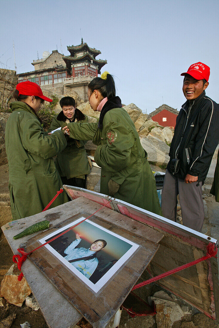 Chinese tourists crowd the summit for sunrise, local photographers waiting for business, Mount Tai, Tai Shan, Shandong province, World Heritage, UNESCO, China