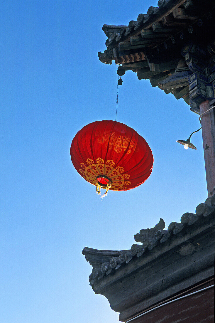 Red lantern hung at a gate and high walls of Luo Hou Temple, Mount Wutai, Wutai Shan, Five Terrace Mountain, Buddhist Centre, town of Taihuai, Shanxi province, China