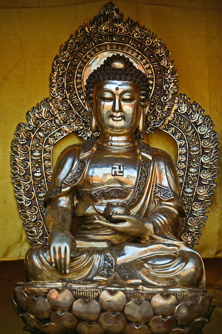 Buddha statue at a shop in Taihuai, Mount Wutai, Wutai Shan, Five Terrace Mountain, Buddhist Centre, town of Taihuai, Shanxi province, China