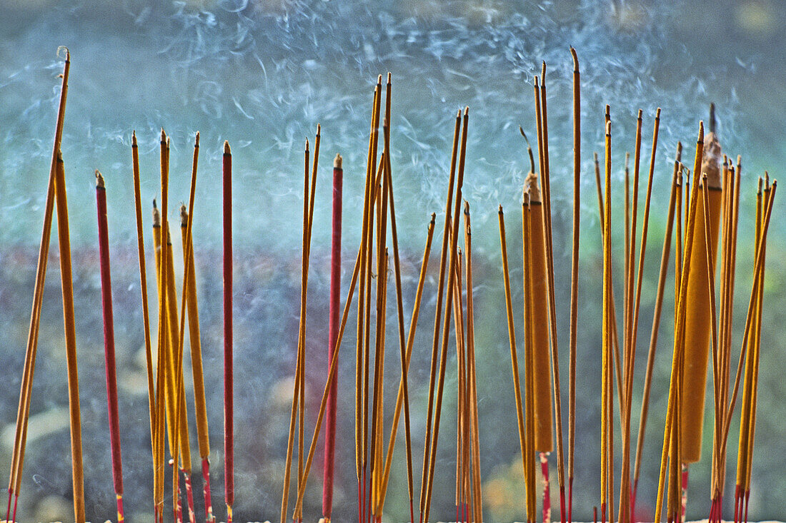 close-up smoking incense sticks, religious rites, China, Asia