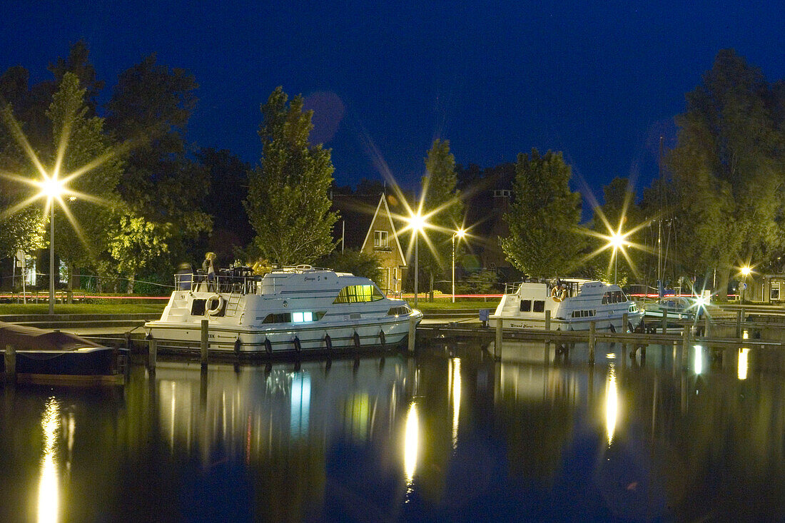 Crown Blue Line Houseboats at Night,Earnewald, Frisian Lake District, Netherlands