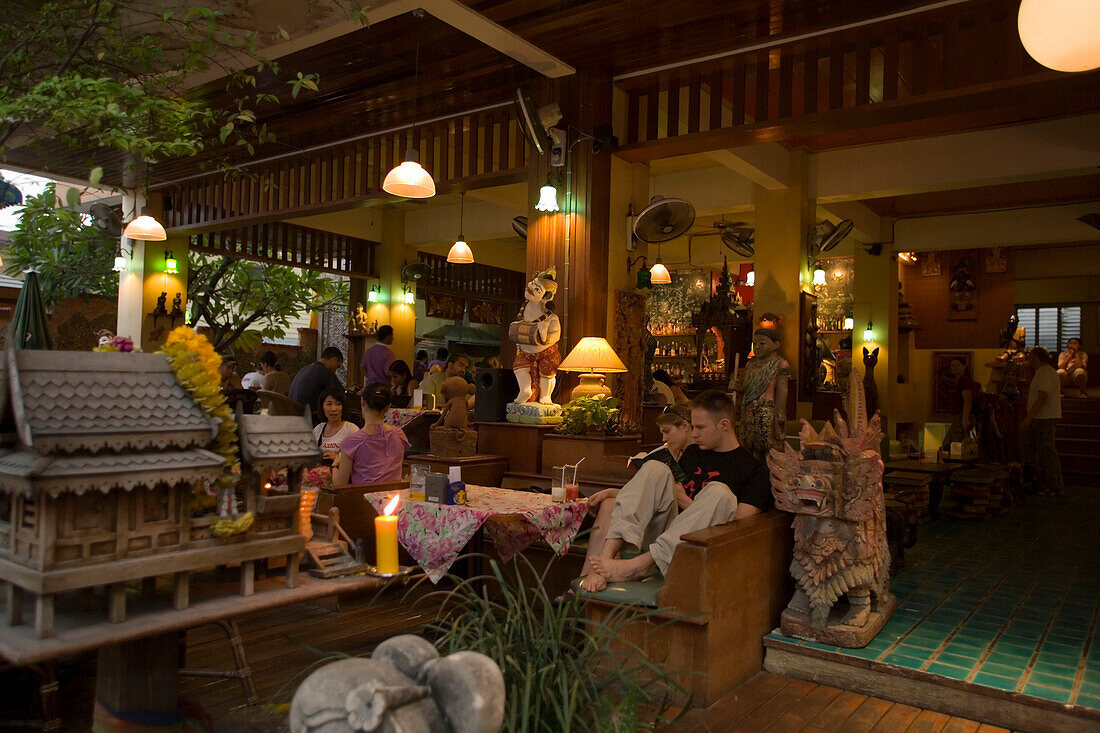 Tourists relaxing in a hotel bar, Banglamphu, Bangkok, Thailand