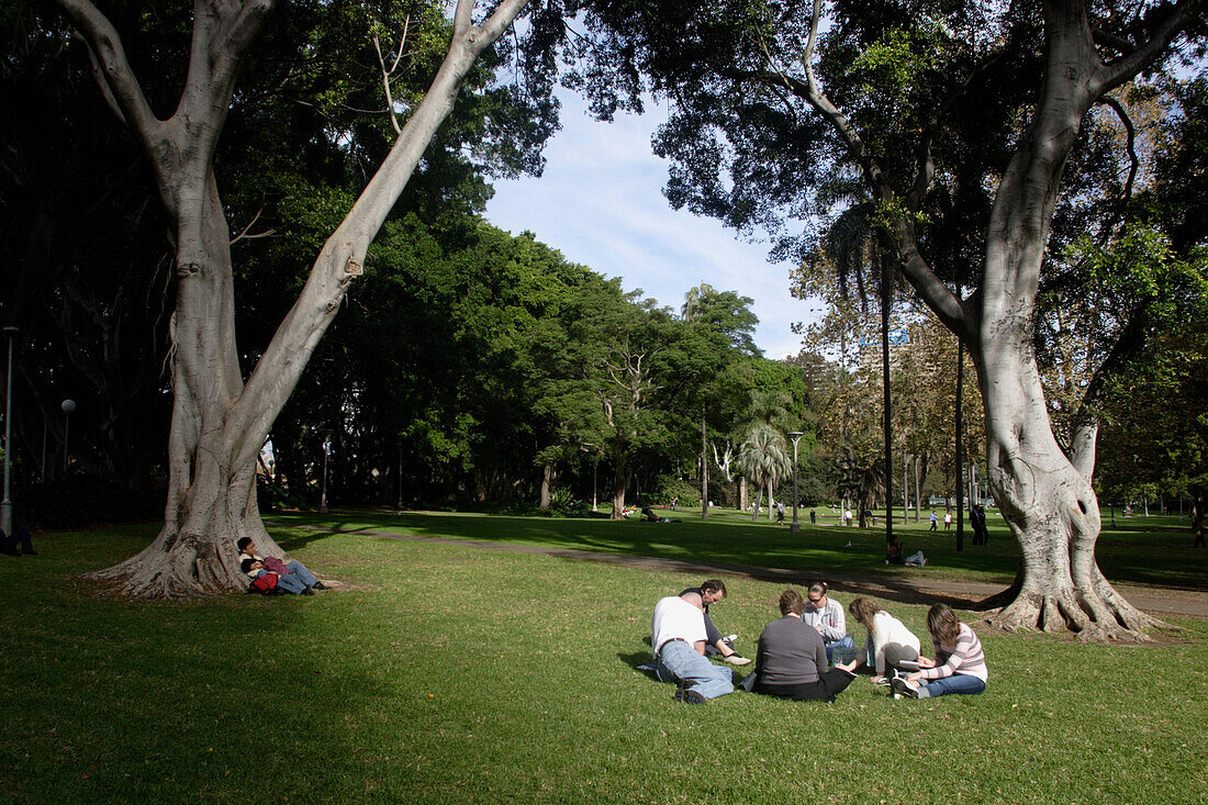 students relaxing in Hyde Park, state Capital of New South Wales, Sydney, Australia