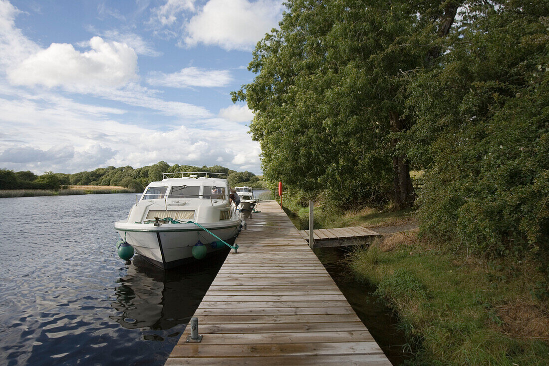 Houseboats at Tully-Inishmore Jetty, Inishmore Island, Lough Erne, County Fermanagh, Northern Ireland