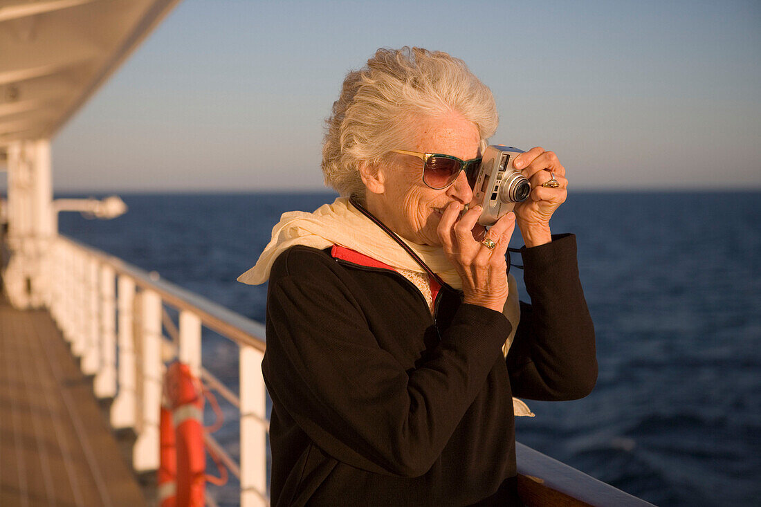 Taking picture on Deck 5 Walkway, Aboard MS Bremen Cruise Ship, Hapag-Lloyd Kreuzfahrten, Germany