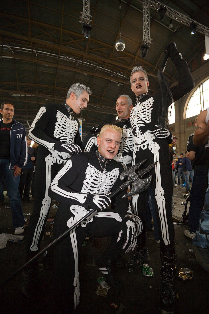 Four raver, dressed up as skeleton, at an opening in the station, Street Parade (the most attended technoparade in Europe), Zurich, Canton Zurich, Switzerland
