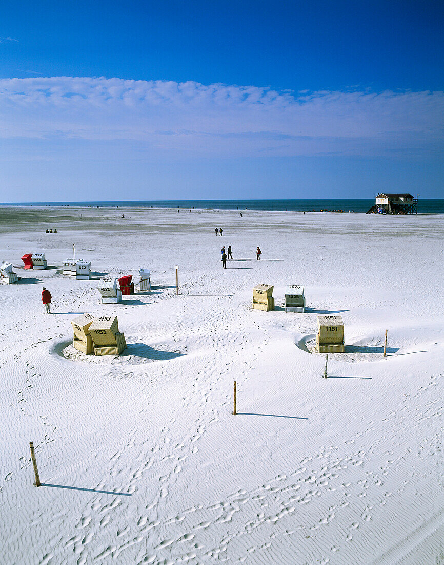 Group of hooded beach chairs, St. Peter Ording, Schleswig Holstein, Germany