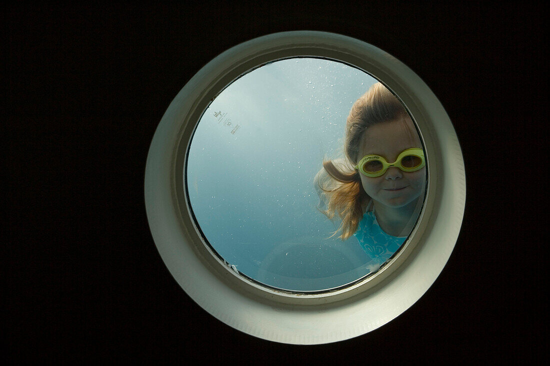 Girl Looking Through Swimming Pool Porthole, Aboard Star Clippers Star Flyer Sailing Ship, Aegean Sea