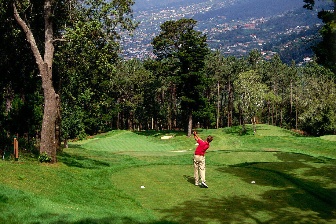 Man playing golf at Palheiro Golf Club, Funchal, Madeira, Portugal, Europe