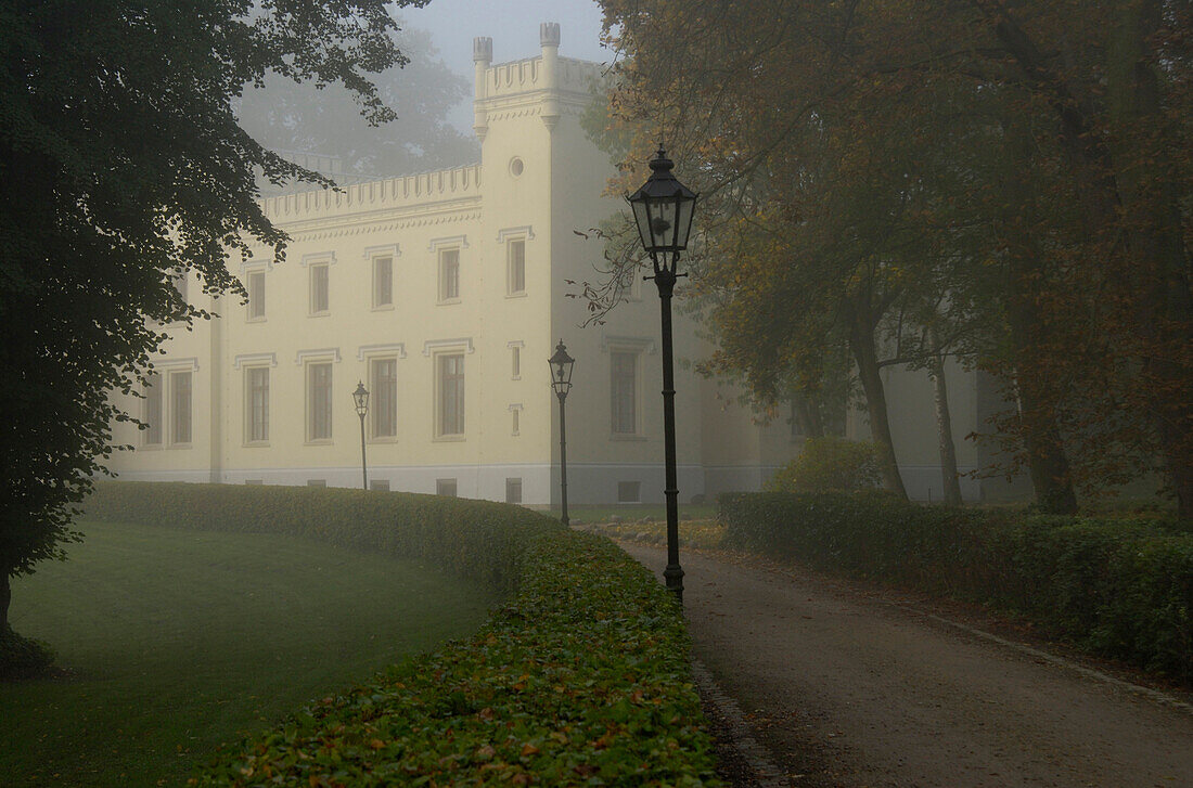 Kittendorf castle in the fog, Stavenhagen, Mecklenburg-Western Pomerania, Germany, Europe