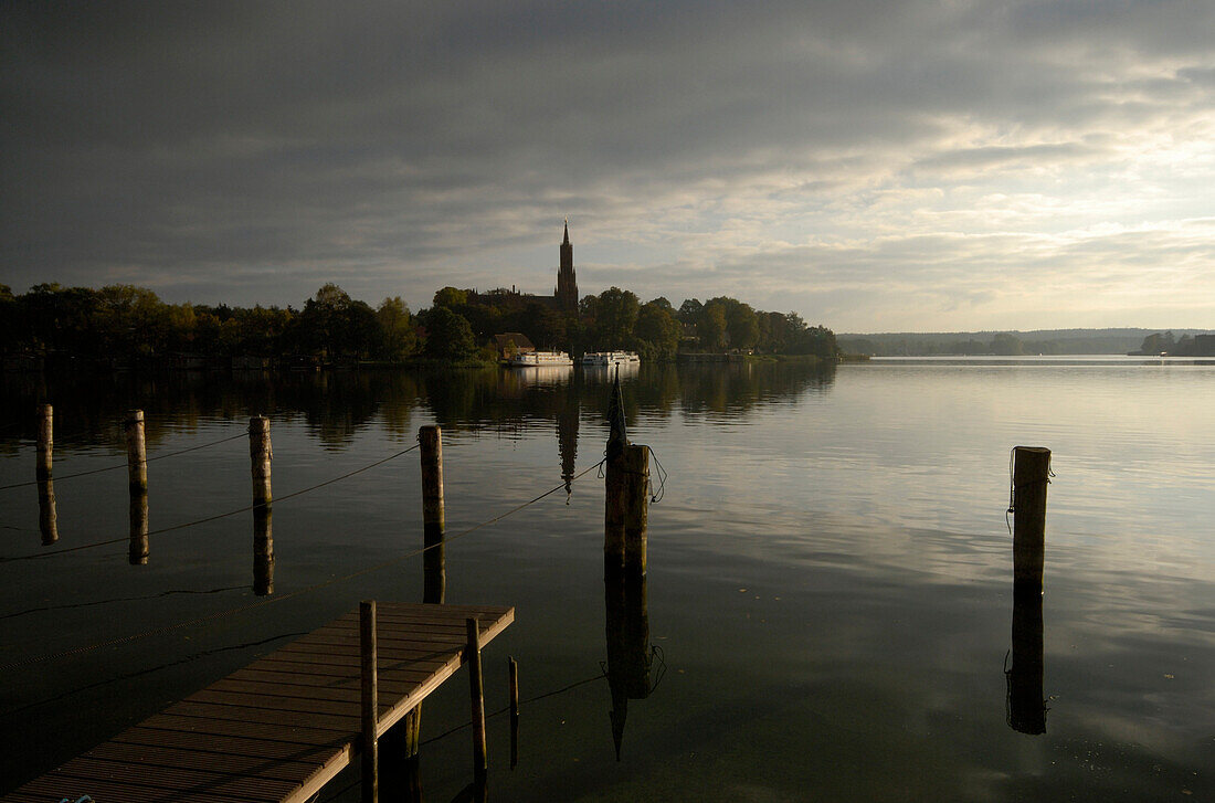 Lake Malchow with church in the background, Mecklenburg-Pomerania, Germany, Europe