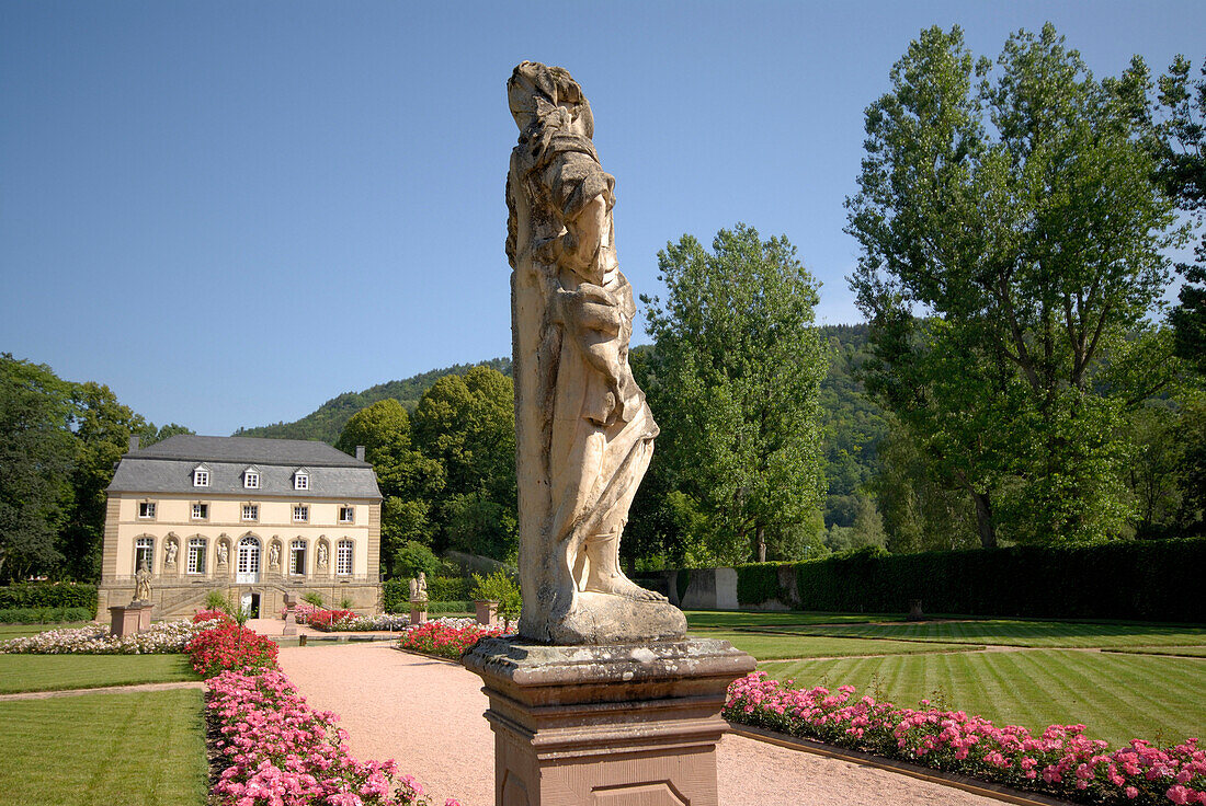 The orangery and the prelate garden under blue sky, Echternach, Luxembourg