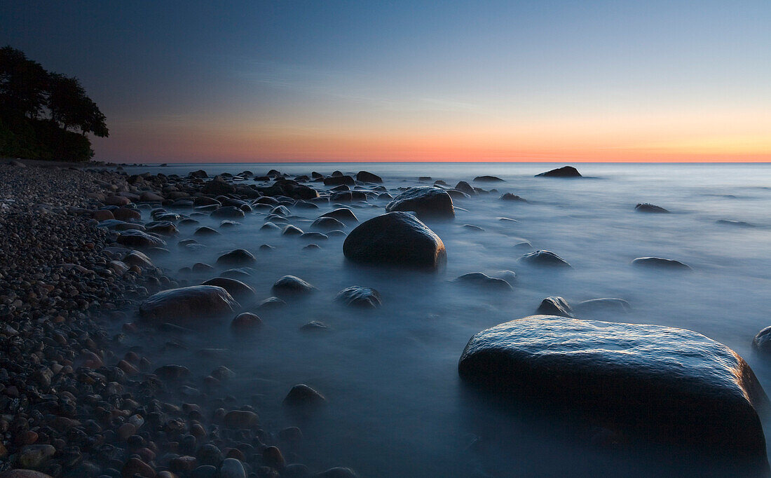 The sea shore at dusk, Jasmund national park, Rugen Island, Mecklenburg Western Pommerania, Germany