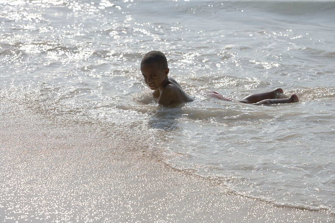 Boy on Beau Vallon Beach,Beau Vallon, Mahe Island, Seychelles