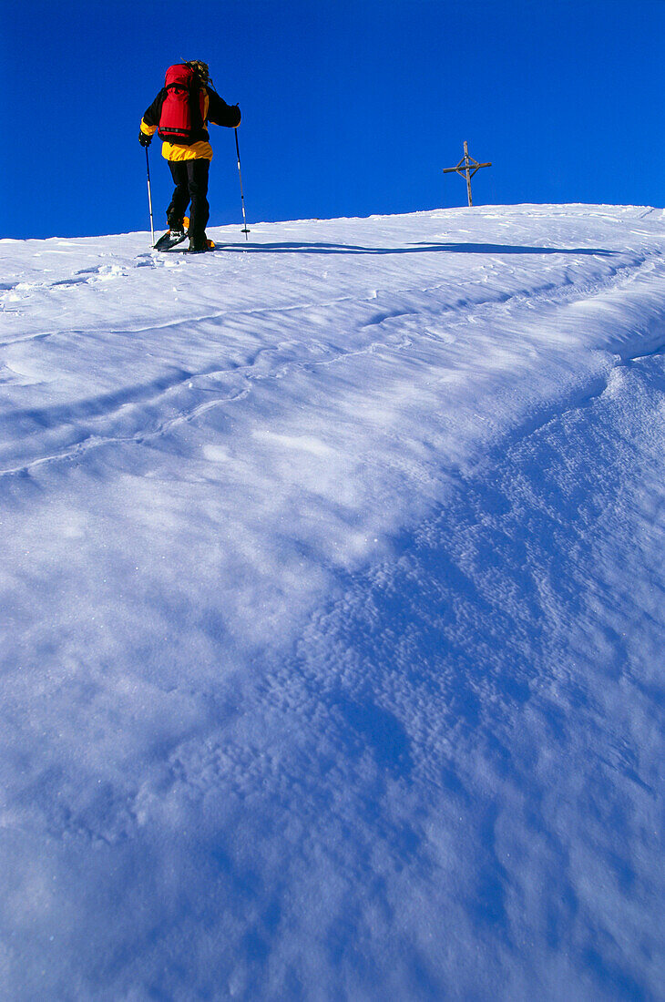 A man snowshoeing, Dolomites, Italy