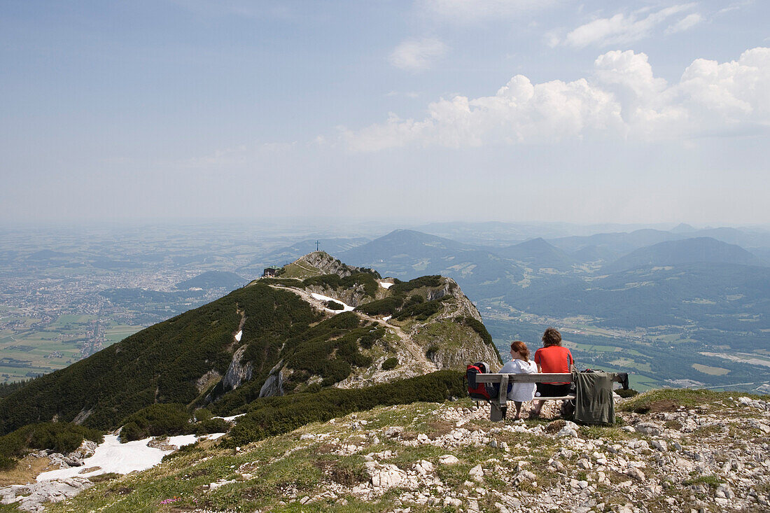 Two hikers admiring the view from Untersberg Mountain, Near Salzburg, Austria