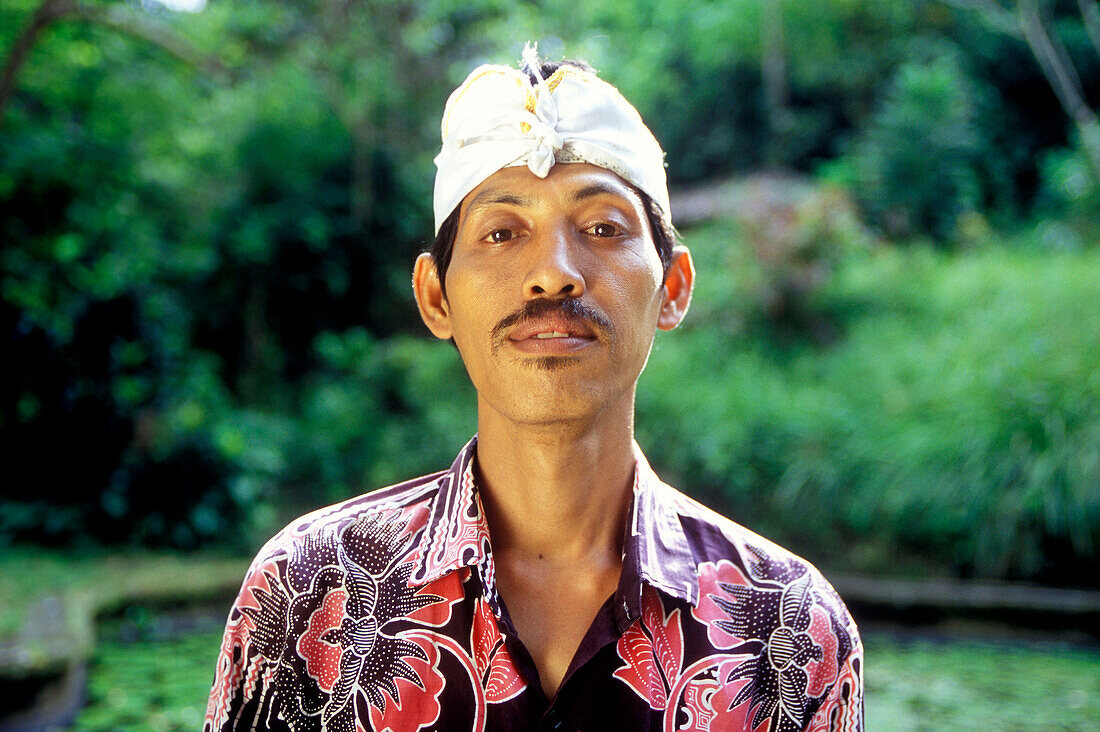 portrait of a balinese temple guide, bali, indonesia