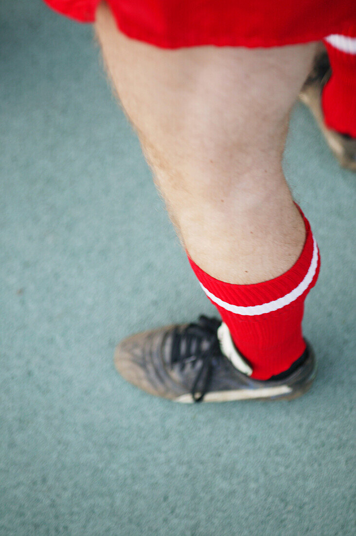 Soccer player, close-up leg