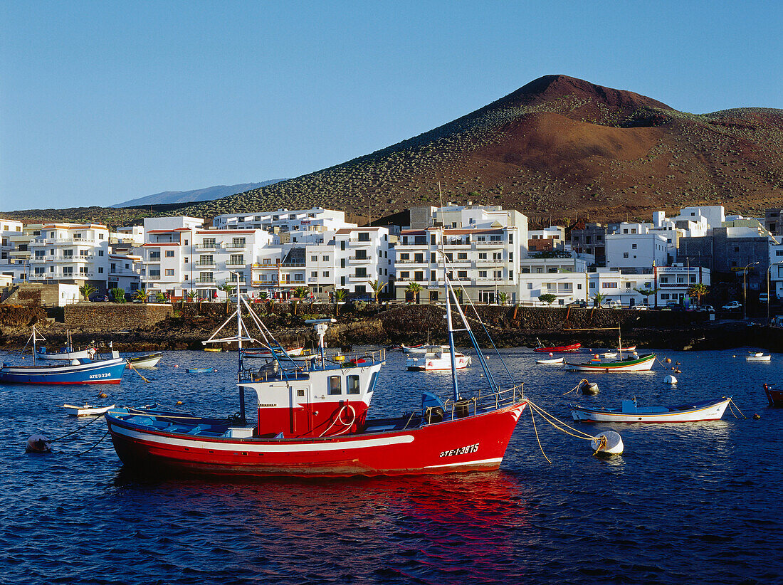 Fishing boats, fishing port, village and volcano, La Restinga, El Hierro, Canary Islands, Atlantic Ocean, Spain