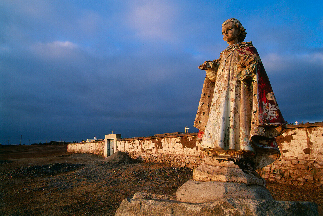 Holy Mary statue in front of cemetery at Pan American Highway, Highway 5, Huentelaquén, Chile