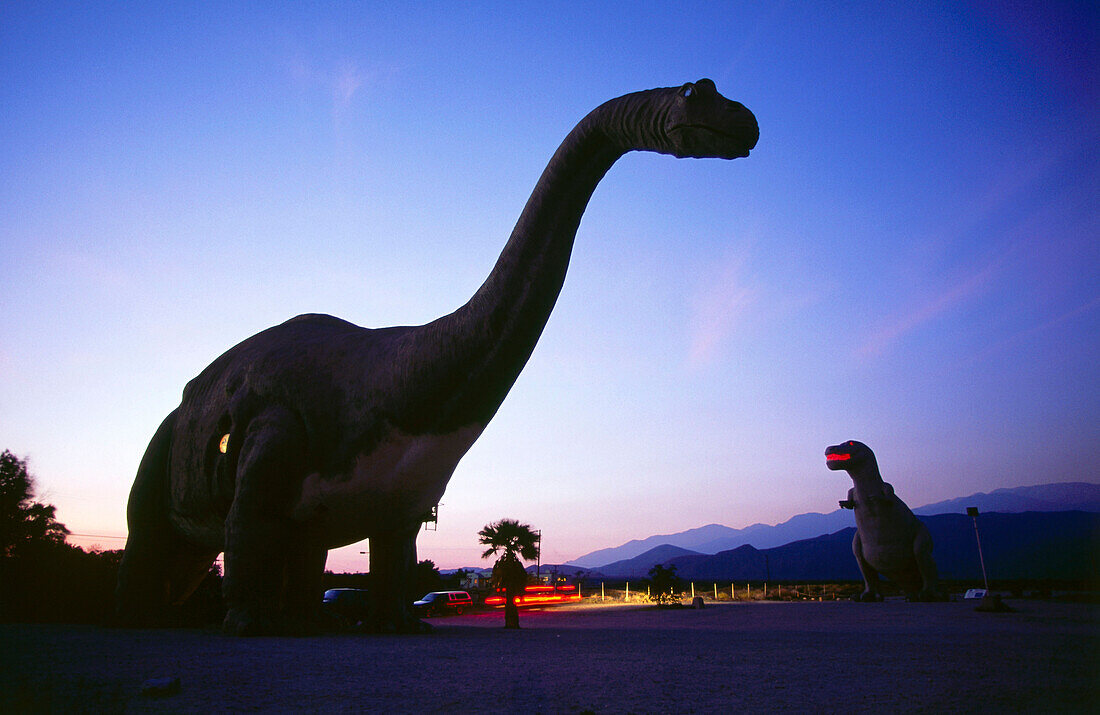 Dinosaurs at truck stop Wheel Inn, Interstate 10, Cabazon, west of Palm Springs, Southern California, USA
