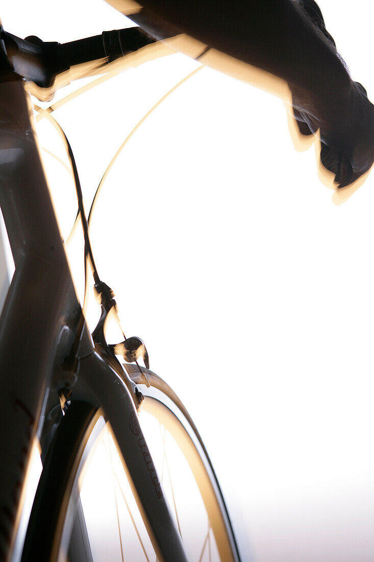 Cyclist riding a bicycle, close-up