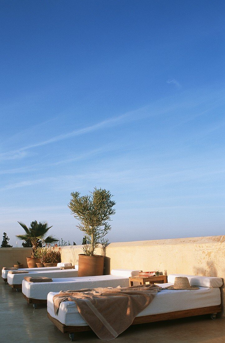 A lounger with towels on a terrace (Morocco)