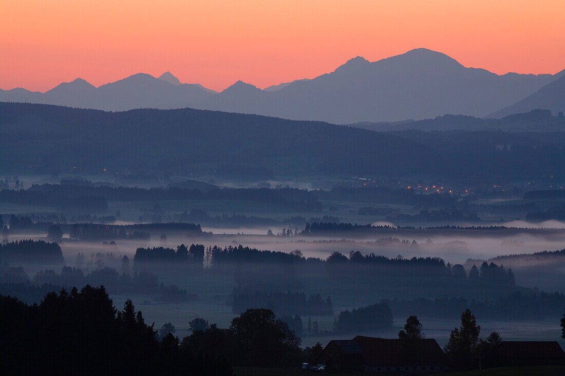 View from Auerberg at sunrise, near Bernbeuren, Allgaeu, Upper Bavaria, Bavaria, Germany