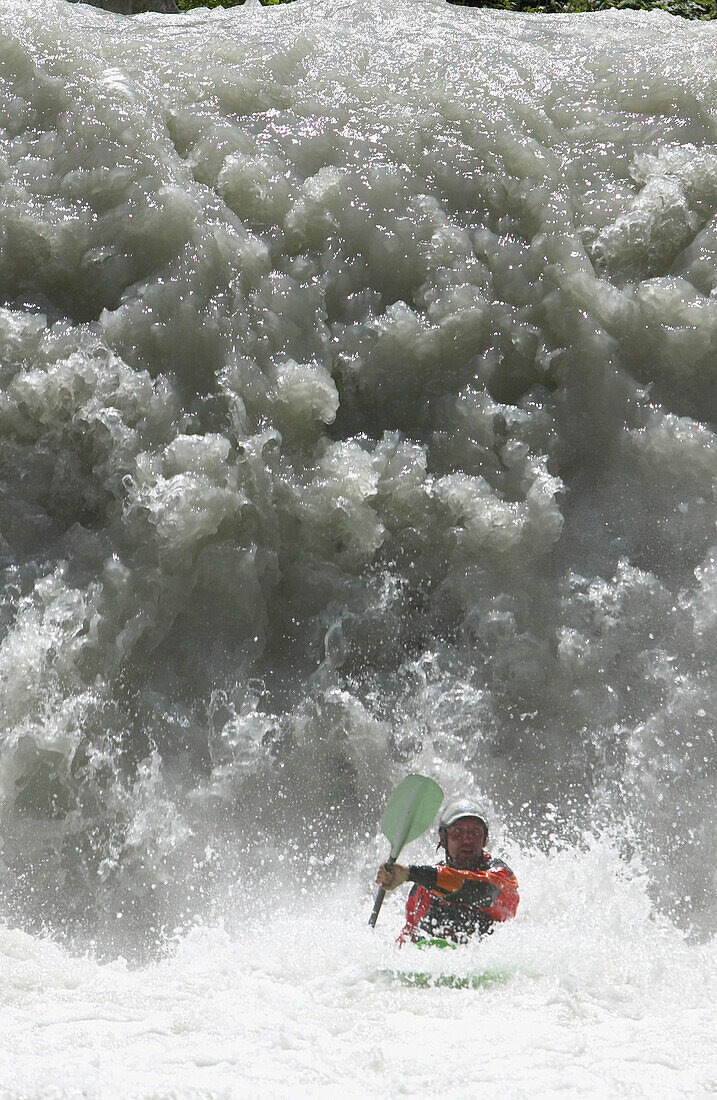 Man kayaking in rapid waters, Lauterbrunnen, Canton Bern, Switzerland