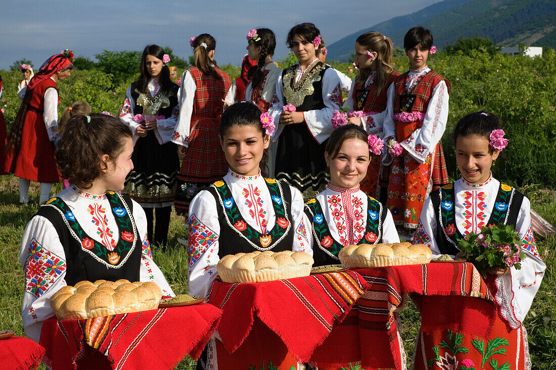 Young women in traditional costumes at Rose Festival, Karlovo, Bulgaria, Europe