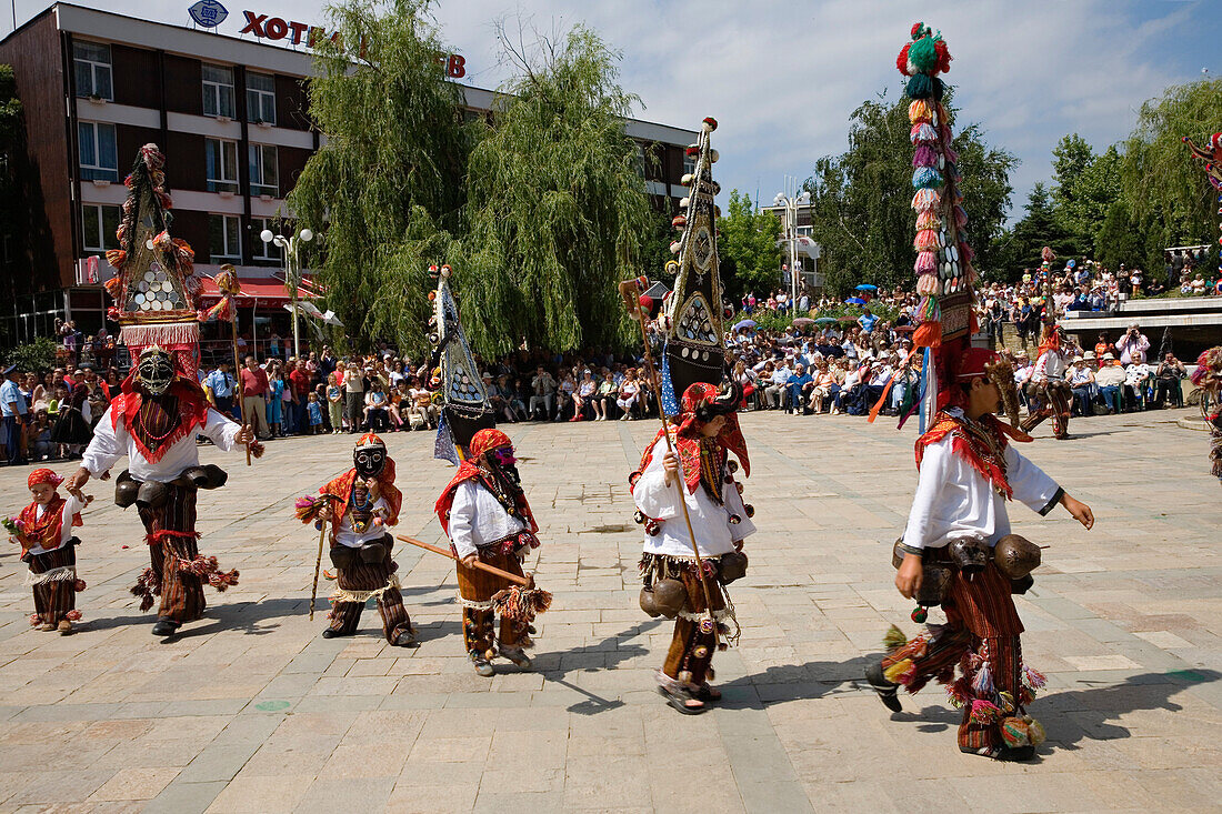 People in traditional costumes with masks, Rose Festival, Karlovo, Bulgaria, Europe