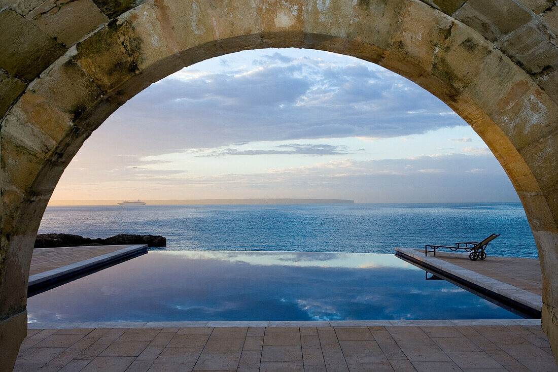 Hotel Maricel and swimming pool at sunrise, Palma, Majorca, Spain
