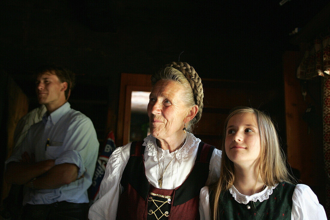 Mature woman and granddaughter (8-10), hearing