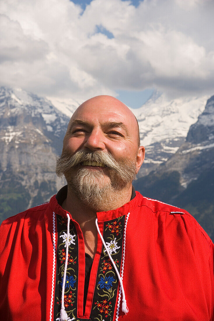 Swiss man smiling in the camera, Portrait, Bussalp 1800 m, Grindelwald, Bernese Oberland, Canton of Bern, Switzerland