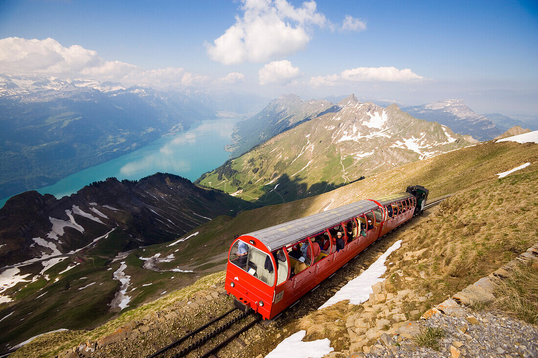 Brienz Rothorn Railway, Switzerlands oldest cogwheel railway, driving uphill, Lake Brienz in the background, Brienz, Bernese Oberland, Canton of Bern, Switzerland