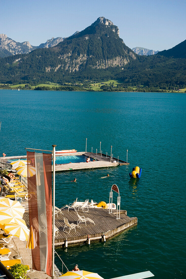 View over lake Wolfgangsee with Hotel Im Weissen Rössl am Wolfgangsee, St. Wolfgang, Upper Austria, Salzkammergut, Austria