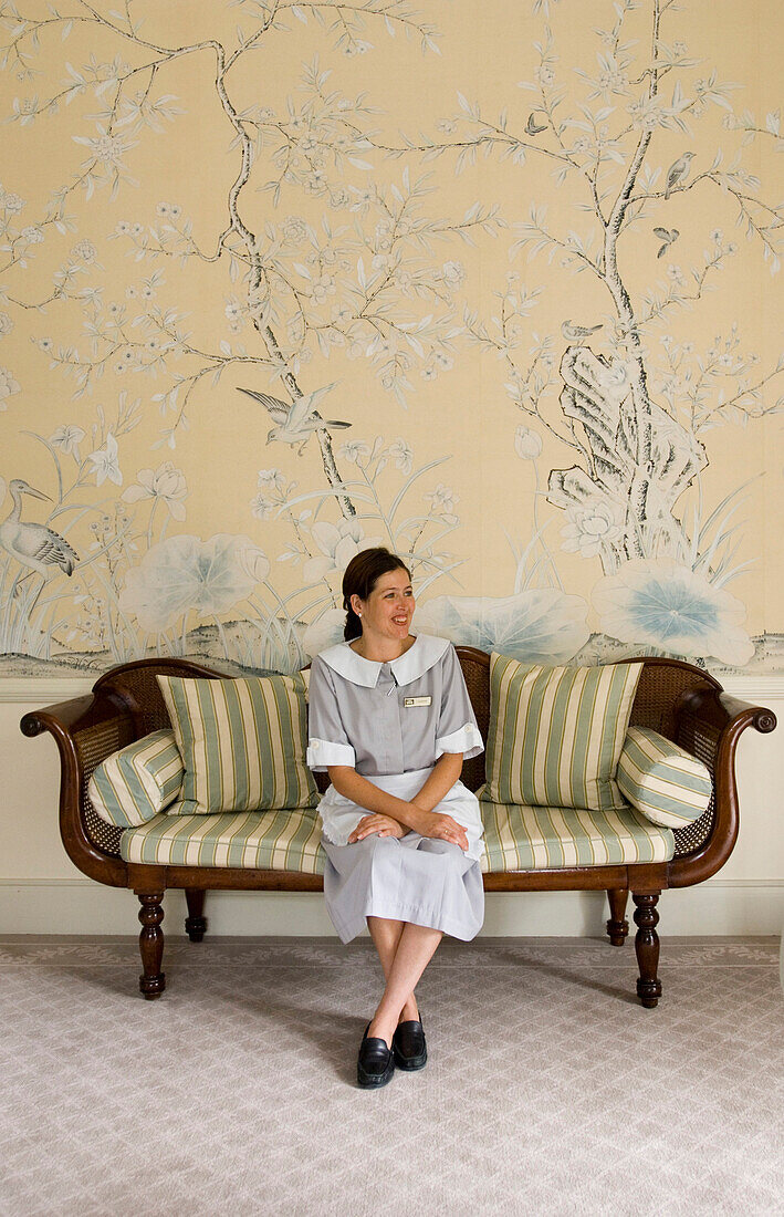 Chambermaid in Churchill Suite des Reids Hotel, Funchal, Madeira, Portugal