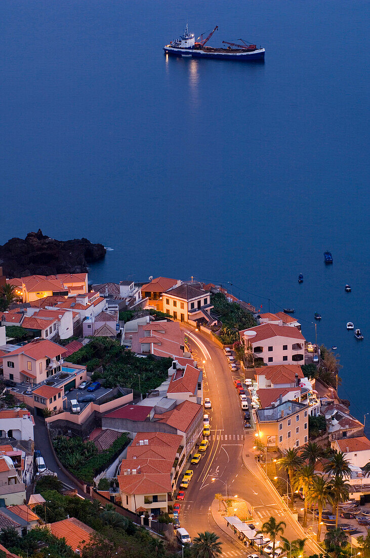Houses on the coast in the evening, Camara de Lobos, Madeira, Portugal