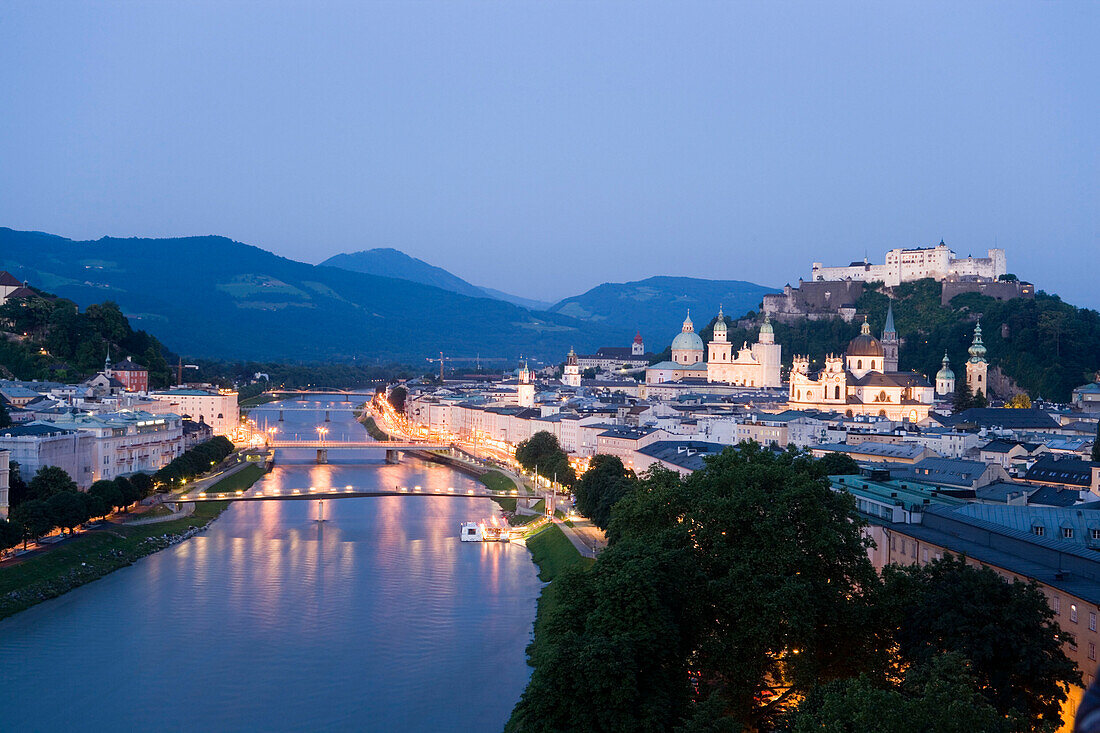 Panoramic view over Salzburg with Salzach, Hohensalzburg Fortress, largest, fully-preserved fortress in central Europe, Salzburg Cathedral, Franciscan Church, St. Peter's Archabbey and Collegiate Church, built by Johann Bernhard Fischer von Erlach in the 