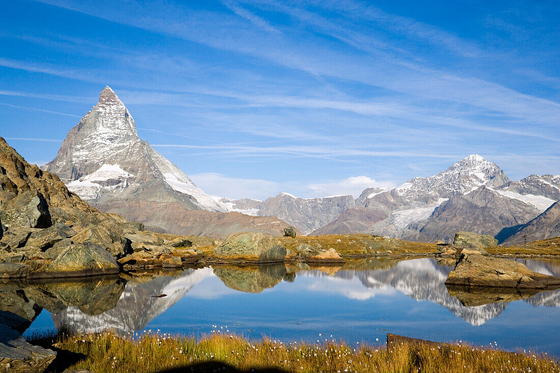 East side (Hörnligrat) of Matterhorn (4478 m) reflected in Riffelsee, Zermatt, Valais, Switzerland