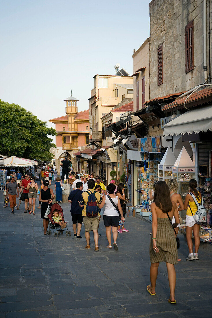 People strolling along shopping street Odos Sokratous, Rhodes Town, Rhodes, Greece, (Since 1988 part of the UNESCO World Heritage Site)
