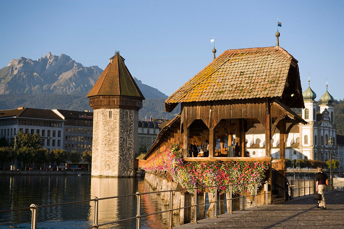 River Reuss with Kapellbrücke (chapel bridge, oldest covered bridge of Europe) and Wasserturm, Jesuit church, first large sacral baroque building in Switzerland, Pilatus in background, Lucerne, Canton Lucerne, Switzerland