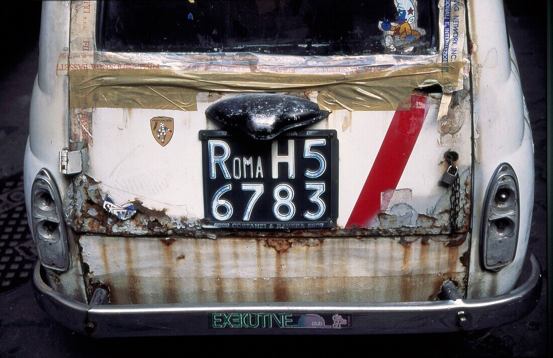 Old rusty Fiat 500, Rome, Italy