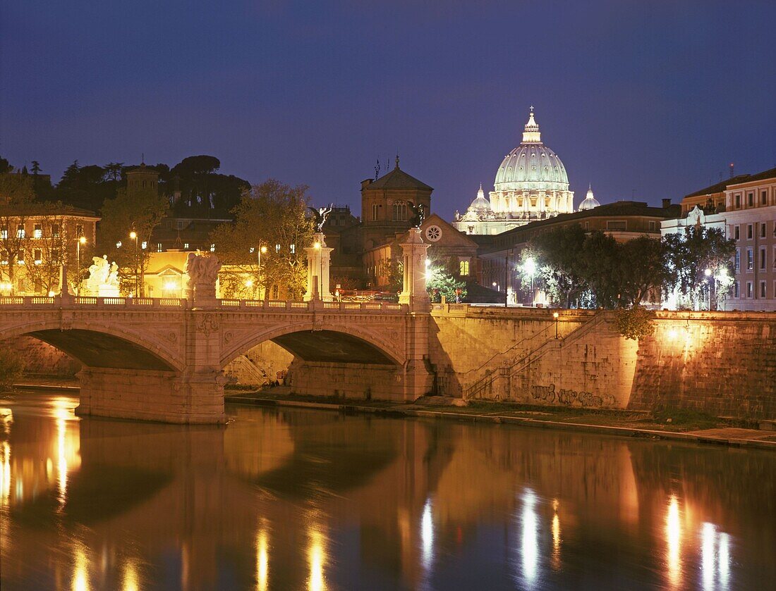 Italy, Rome, bridge over river Tiber, St, Peters Basilica at twilight