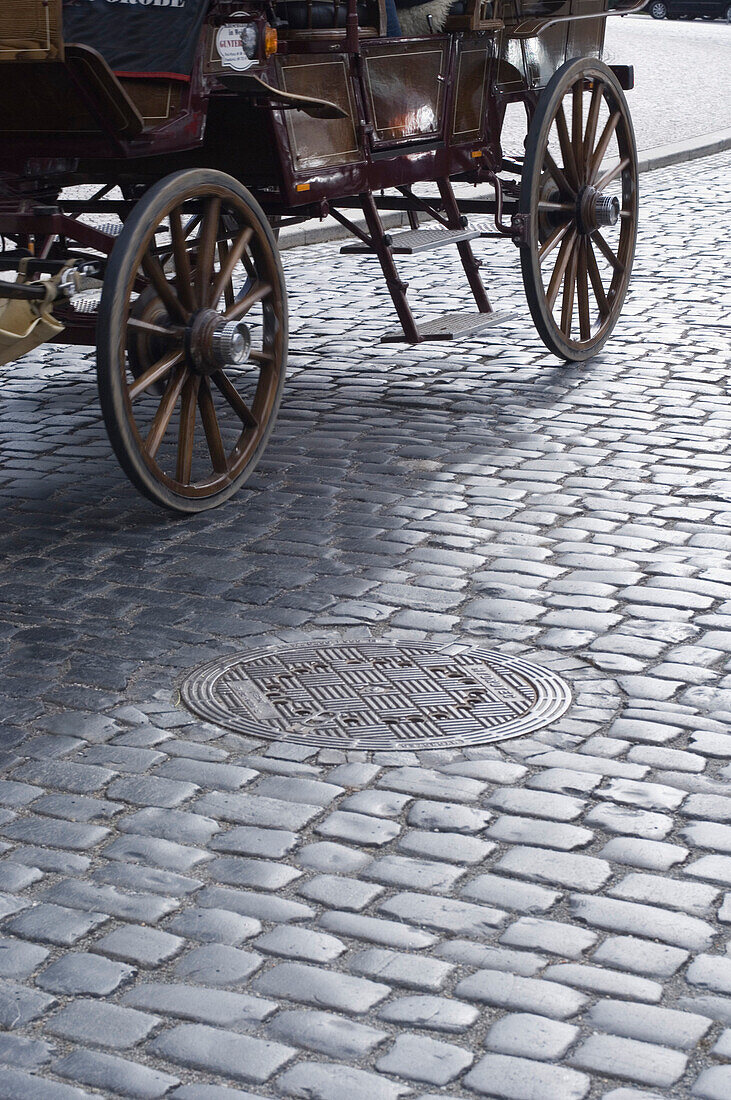 Carriage passing cobblestone, Weimar, Thuringia, Germany
